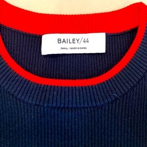 Bailey 44, new navy with red and white stripe, cold shoulders